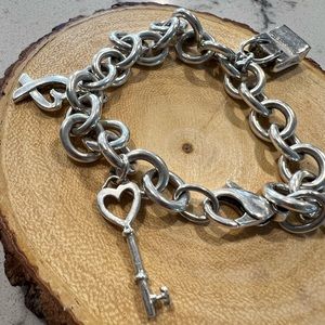Tiffany’s bracelet with 4 charms